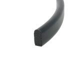 Close-up of black flexible foam tube cut to reveal its porous foam interior in cross-section