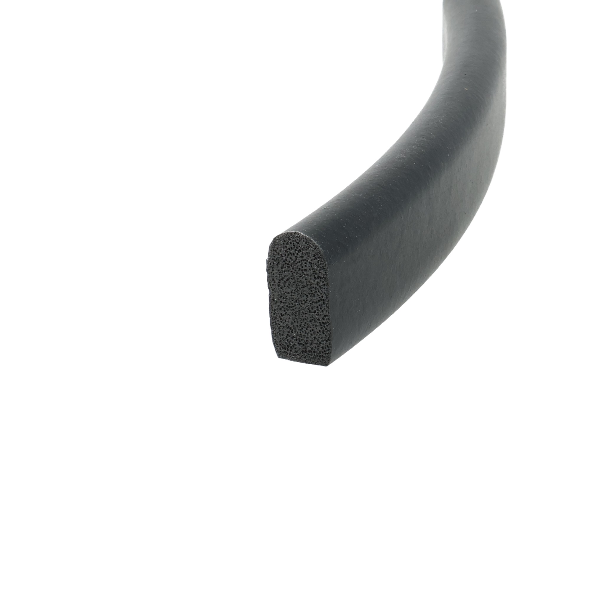uszczelka-gumowa-piankowa-neoprenowa-typ-d-10-x-6mm-czarna-046818n-2 - Centrum uszczelek Close-up of black flexible foam tube cut to reveal its porous foam interior in cross-section