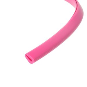 Close-up of a pink plastic tube with a rectangular opening at one end on a white background.