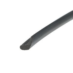 Close-up of a dark gray metal blade with a serrated bottom edge against a white background.