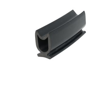 Close-up of a black plastic clip with a rounded open end and U-shaped channel.