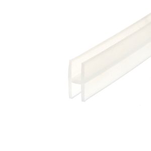 Abstract minimalist image: pale gray diagonal rectangular beam against a white background, suggesting architectural form.