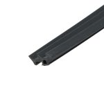 Close-up of a black grooved rail or track piece diagonal across a white background