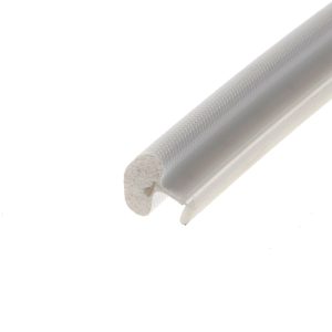 Close-up of a textured metal cylinder (knurled surface) lying diagonally on a white background.