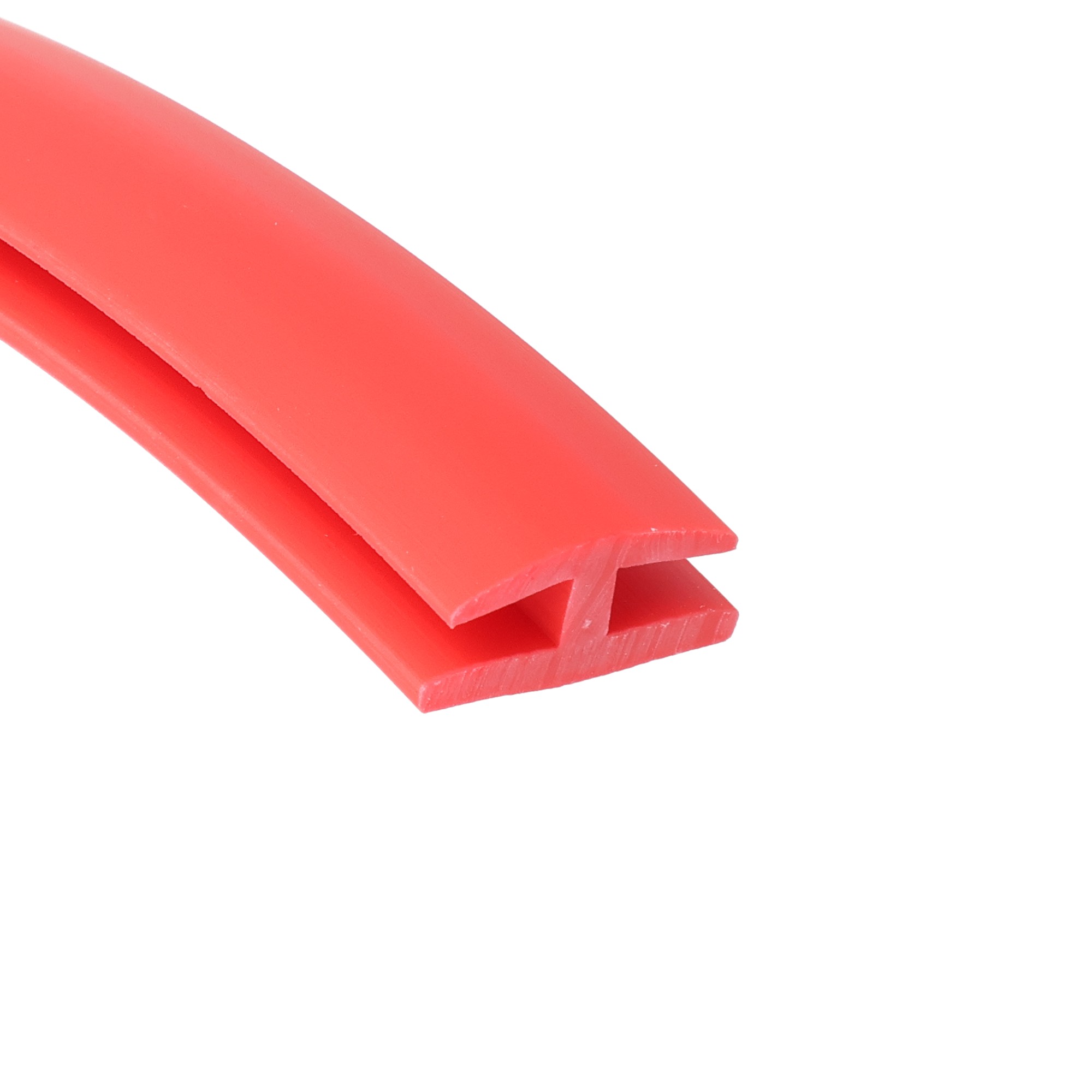uszczelka-krawedziowa-typ-h-miekkie-pvc-4-x-9-x-19mm-czerwona-12-1203-1 - Centrum uszczelek Close-up of a pink plastic clip with interlocking jaws against a white background for contextual detail only.,