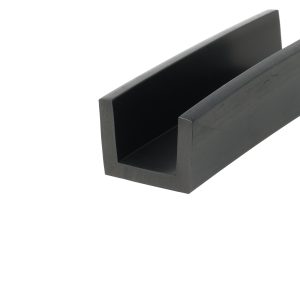 Close-up of a black U-shaped metal channel with hollow interior and squared edges, viewed at an angle.