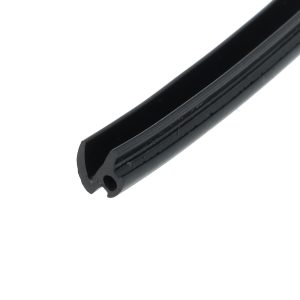 Close-up of a black cylindrical metal rod with a hollow end and ridged exterior.