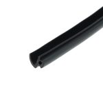 Close-up of a black rectangular hollow extrusion photographed at an angle against a white background.