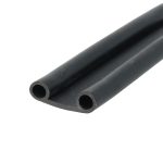 Two black hollow tubes shown at an angle, with circular end openings visible on the left side of the frame, against a white background.