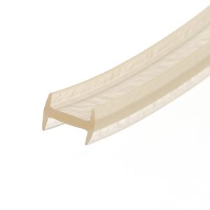 Beige masking tape strip curling diagonally across a white background.