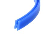 Close-up of a blue curved plastic piece with a hollow rectangular channel on a white background.