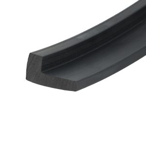 Close-up of a black rectangular metal bar with a beveled edge running diagonally across the image.