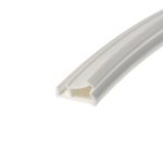 Close-up of a white hollow plastic extrusion with a U-shaped channel, photographed diagonally across a white background.