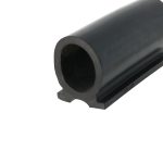 Close-up of a black rubber roller with a circular hollow bore and squared base detail at the end.