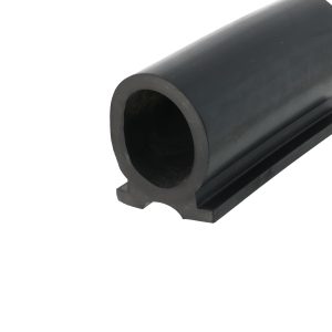 Close-up of a black rubber roller with a circular hollow bore and squared base detail at the end.