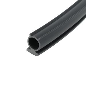 Close-up of a black rubber U-channel extrusion with a hollow circular cross-section and grooved edges