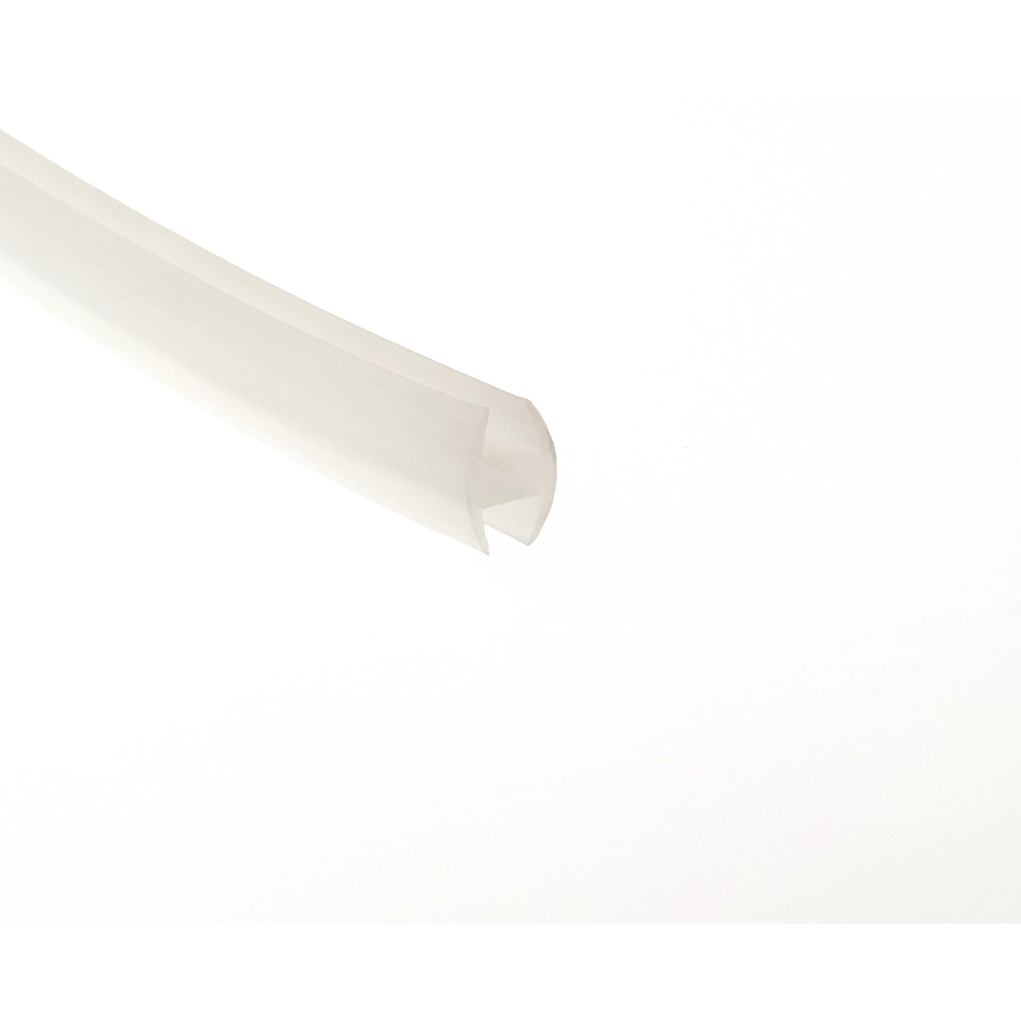 uszczelka-krawedziowa-silikonowa-typ-h-8-x-12-x-17mm-transparent-0990949-3 - Centrum uszczelek Close-up of a white rolled paper-like object diagonally across a white background.