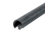 Close-up of a black cylindrical pipe with a hollow end, viewed diagonally.