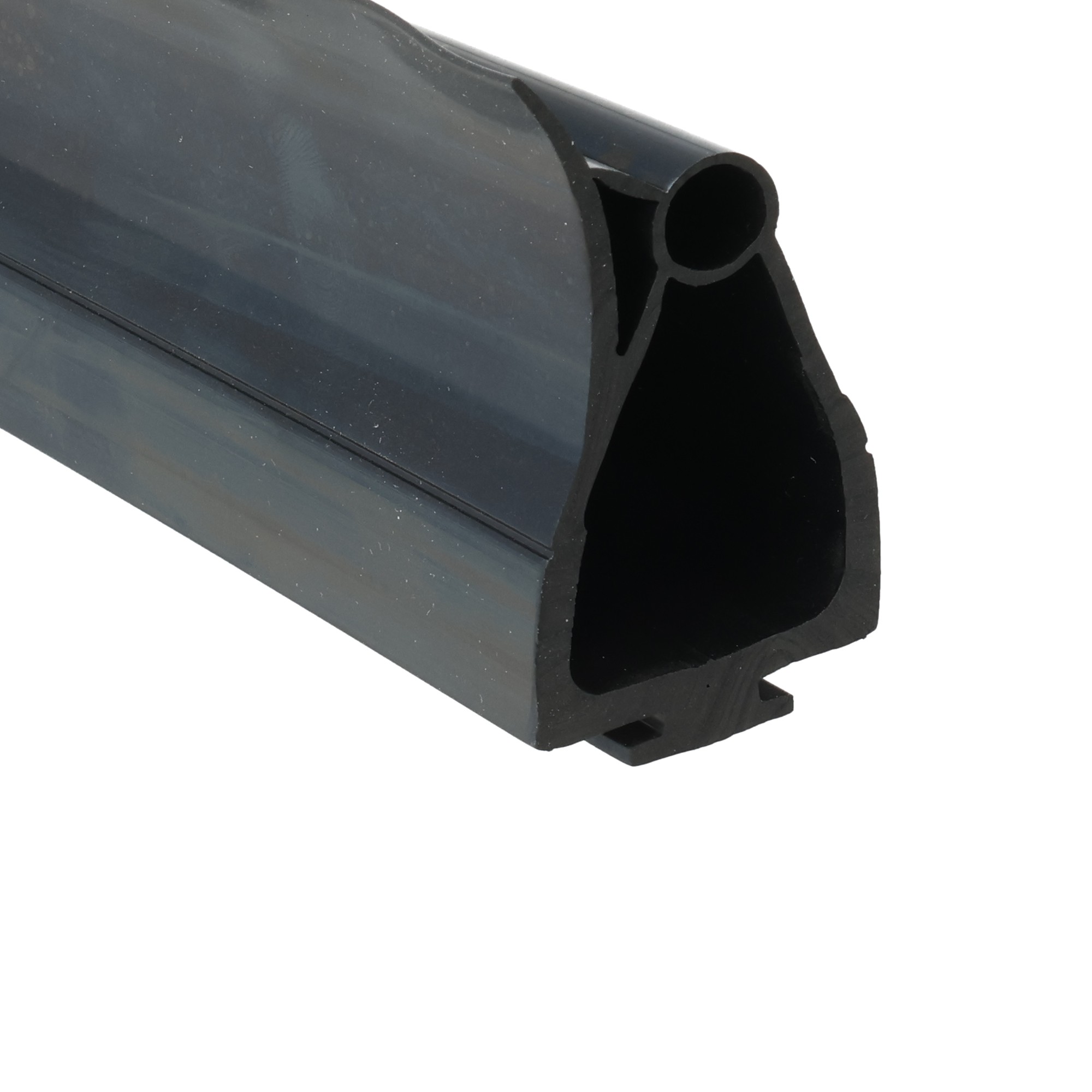 uszczelka-dolna-bramy-garazowej-gumowa-38-x-51mm-czarna-59-055-2 - Centrum uszczelek Close-up of a black rubber extrusion with a hollow circular bore and a small angled support fin visible in a cross-section edge detail.