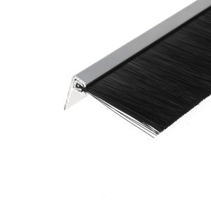 Flat paintbrush with black bristles and a silver ferrule on a white background.