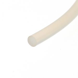 Close-up of a beige cylindrical tube laid diagonally on a white background, viewed from the side.