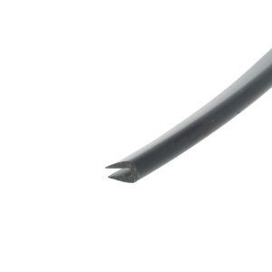 Close-up of a black metal pipe with chipped paint at the end, diagonally oriented across a white background.