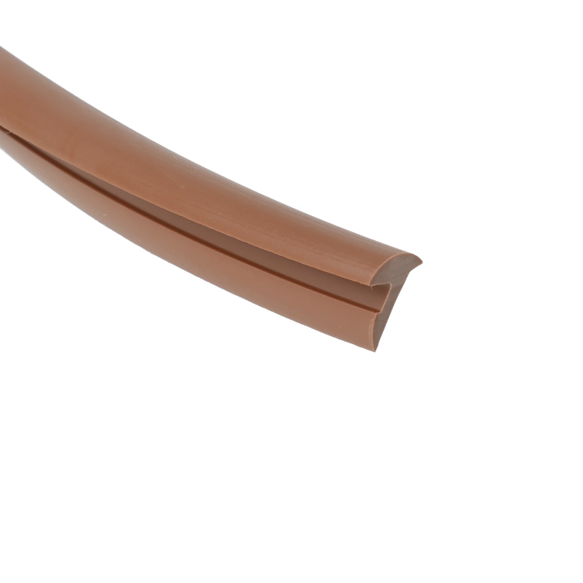 uszczelka-szyby-klinujaca-5-x-85mm-brazowa-026085-2 - Centrum uszczelek Close-up of a curved brown chocolate bar segment with a bite mark at the end on a white background.