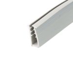 Close-up of a gray plastic extrusion with rectangular grooves running along its length, diagonal angle.