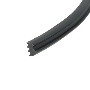 Close-up of a black bicycle tire edge with visible wear marks against a white background