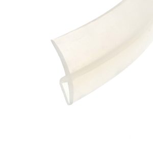 Close-up of a beige paper roll viewed from the side, showing a curved edge against a white background.