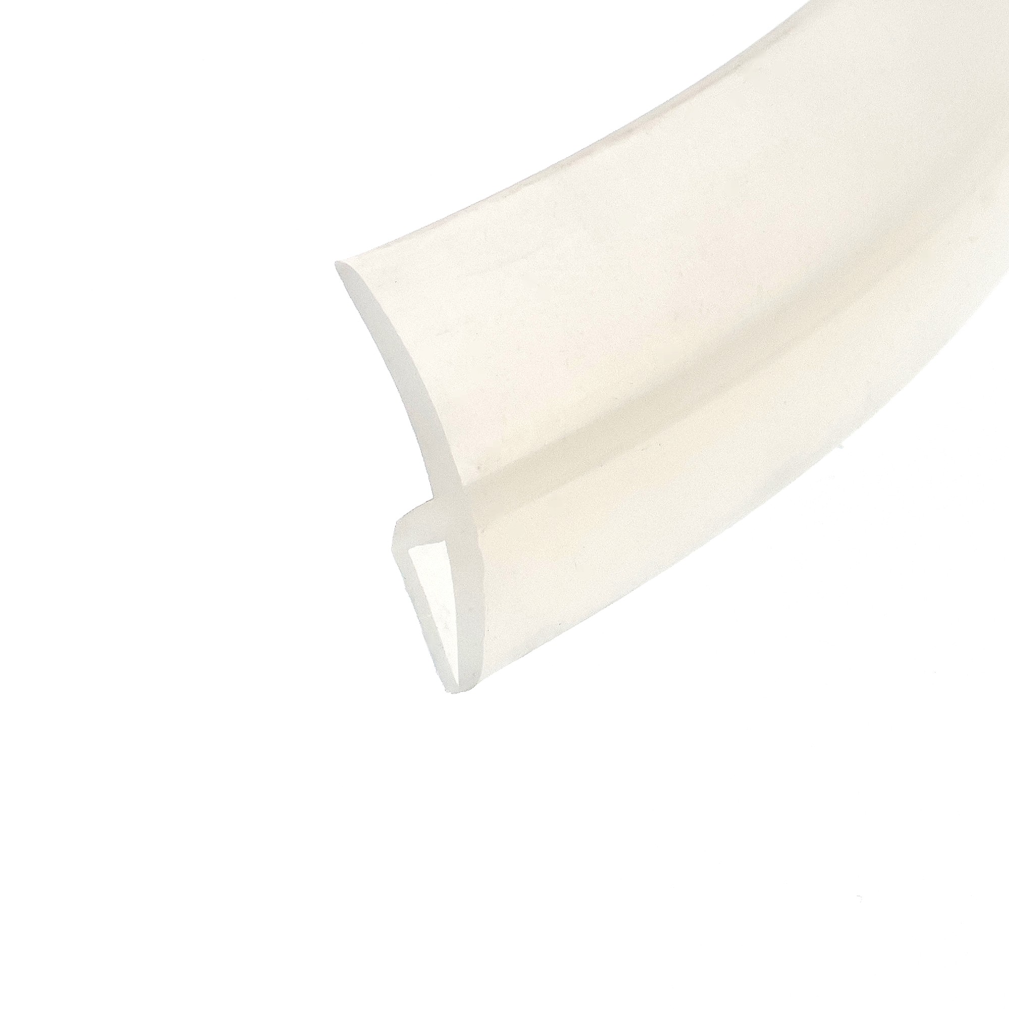 uszczelka-krawedziowa-silikonowa-typ-h-43-x-73-x-30mm-transparent-09911901-1 - Centrum uszczelek Close-up of a beige paper roll viewed from the side, showing a curved edge against a white background.