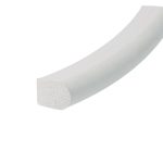 Close-up of a pale gray foam block with a porous cut end, resembling a piece of insulation foam from its cross-section.