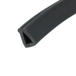 Close-up of a black cylindrical rubber strip with a seam running along its length, viewed diagonally across white background.
