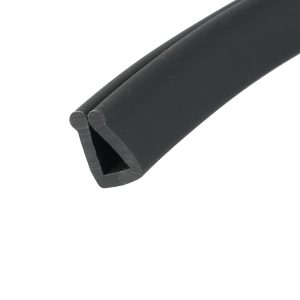 Close-up of a black cylindrical rubber strip with a seam running along its length, viewed diagonally across white background.