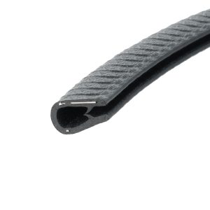 Close-up of a black zipper slider along the textured teeth of the zipper, shown at an angle.