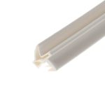 Close-up of a white cylindrical object with a rounded end, showing beige inner lining and subtle shadows.