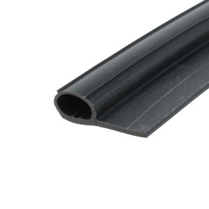 Close-up of a black hollow rubber seal extrusion with a rounded cross-section used for sealing.