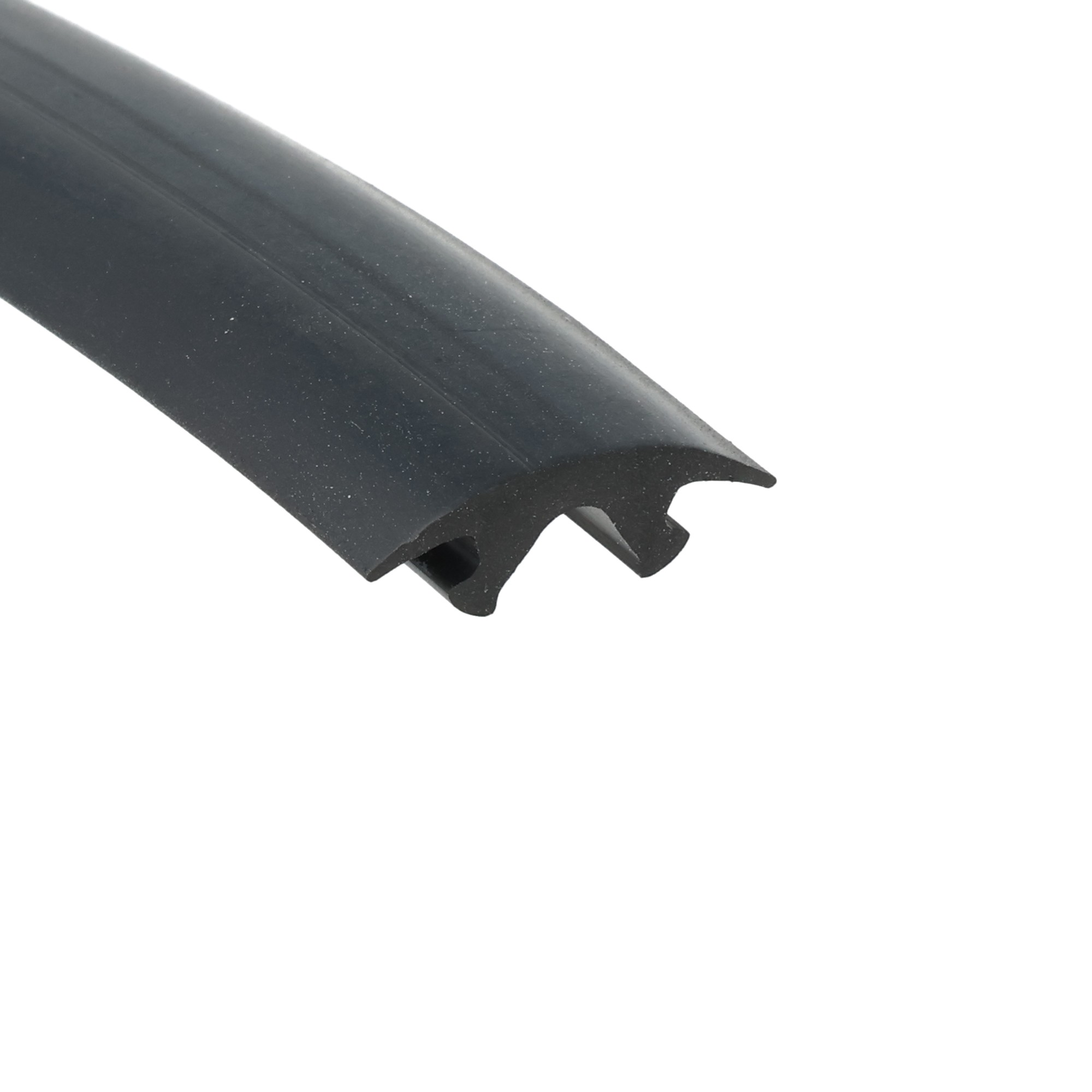 0357525_342 - Centrum uszczelek Close-up of a dark curved plastic edge with a small notch and light specks, set against a white background.