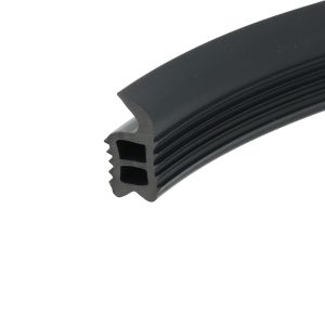 Close-up of a black rubber gasket with square hollow channels showing a cross-sectional profile