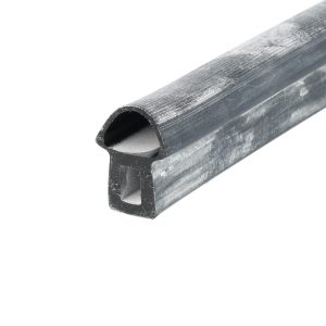 Close-up of a weathered gray metal tubing with a hollow end.