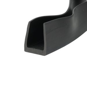 Close-up of a black plastic clip or channel with a rounded inner edge and rectangular sides.