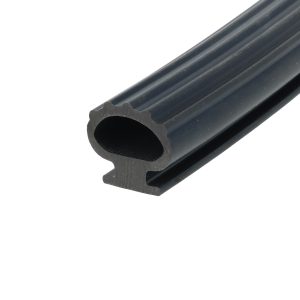 Close-up of a black rubber extrusion with a hollow circular bore and ridged outer surface, photographed at an angle.
