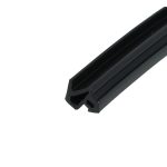 Close-up of a black, grooved extrusion or rail seen diagonally against a white background, revealing a rectangular cross-section with a hollow channel at the end.