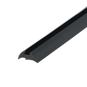 Close-up of a black metal tool blade with jagged teeth along the bottom edge, set diagonally.