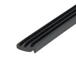 Close-up of a black, grooved plastic rail running diagonally across the frame.