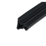 Close-up of a black anodized aluminum extrusion with parallel ridges and a rounded end, photographed at an angle.