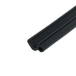 Close-up of a black plastic U-shaped rail or channel with rounded ends, diagonally oriented across the image.