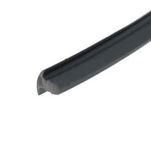Close-up of a diagonal black rubber/metal edge with a beveled tip against a white background, likely a tool part or seal.