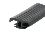 Close-up of a black rubber extrusion with a ribbed top surface and a hollow, channelled cross-section