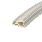 Close-up of white plastic extrusion with diagonal grooves, showing a hollow channel edge.